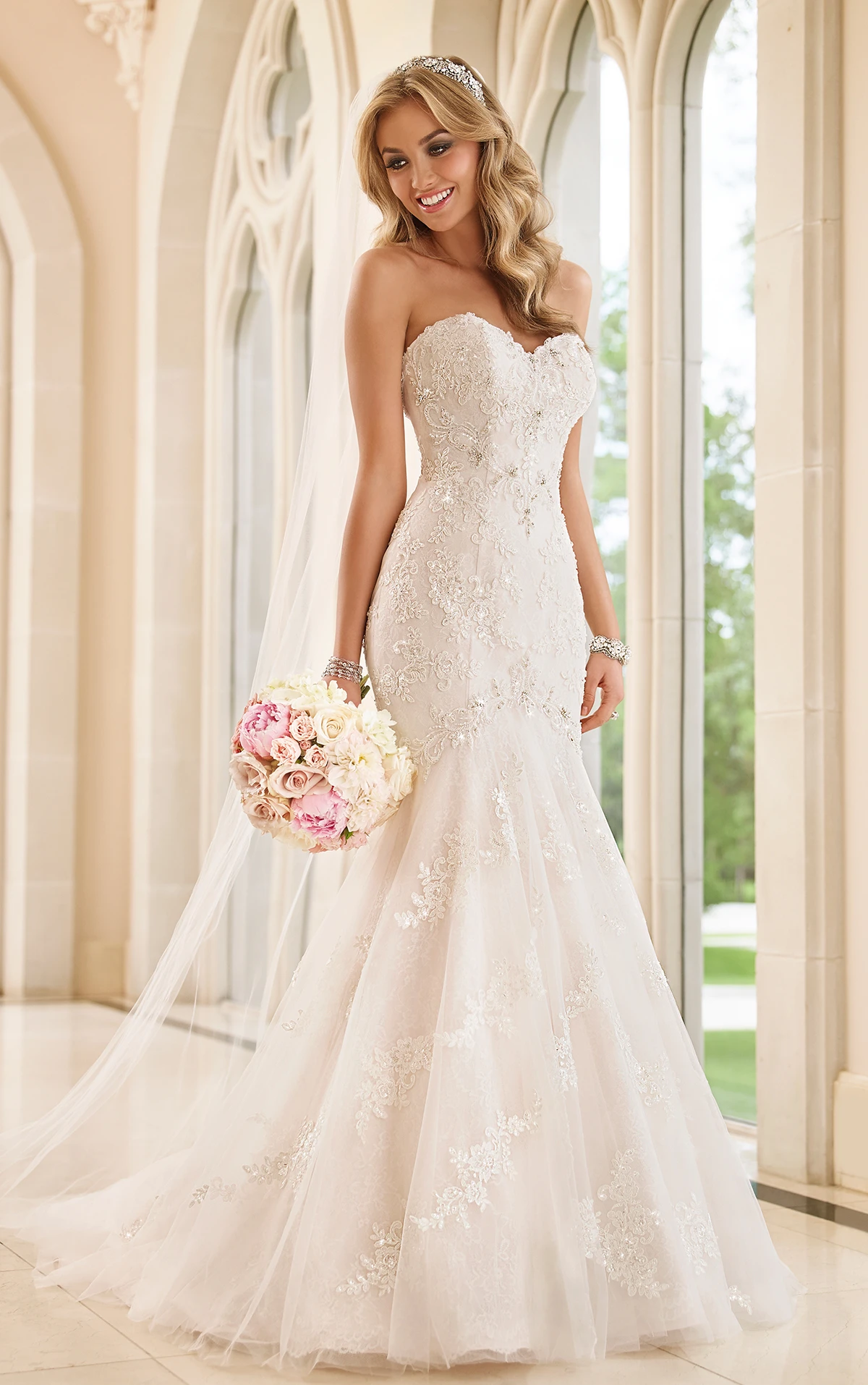 fit and flare wedding dress with lace sleeves