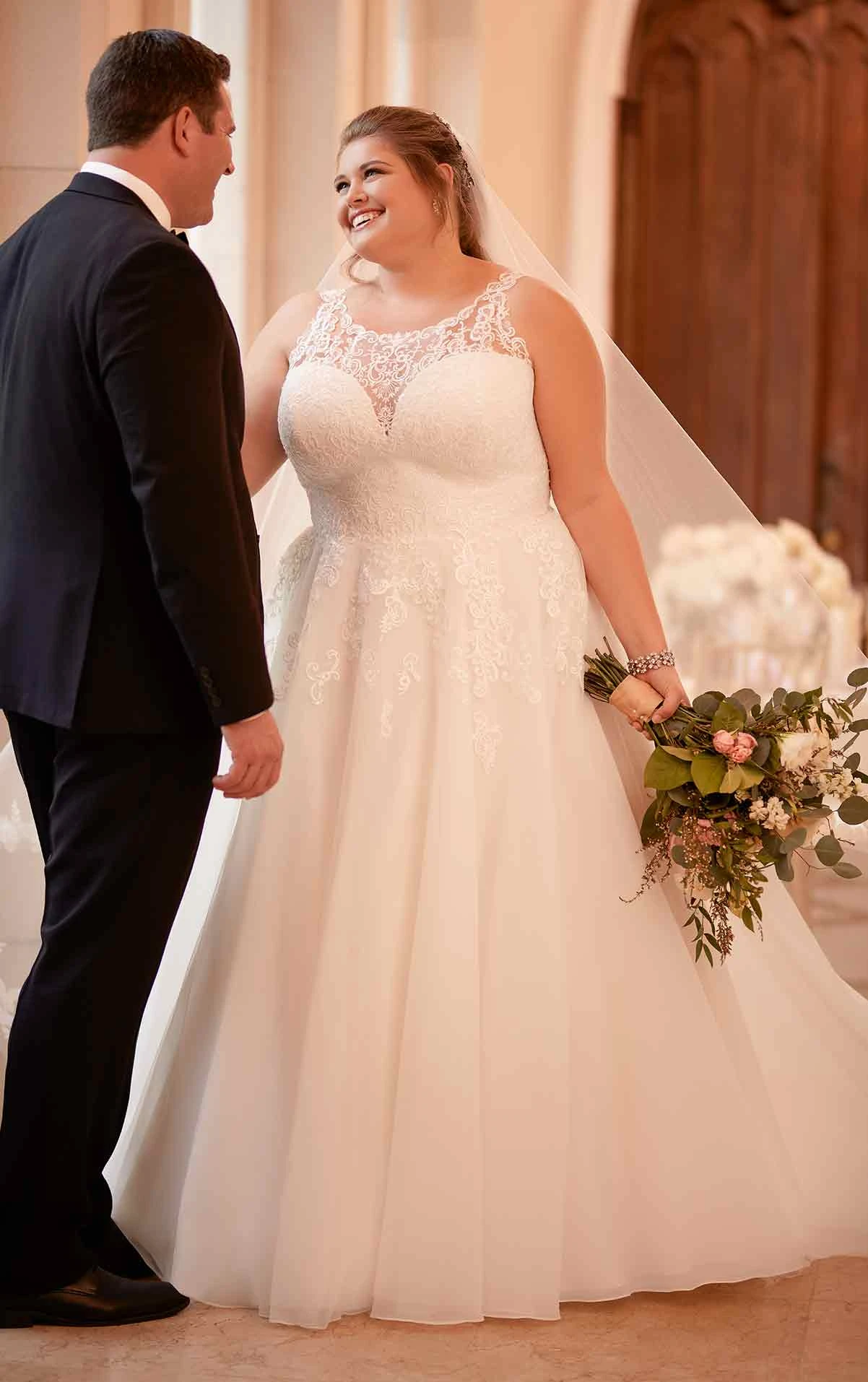 Stunning Plus Size Bride In A Corset Dress With Long Sleeves V Neck And A Chiffone Skirt Plus Wedding Dresses Wedding Dresses Lace Wedding Dress Long Sleeve
